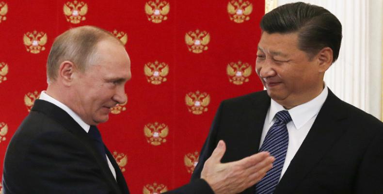 Presidentes de Rusia, Vladímir Putin, y de China, Xi Jinping