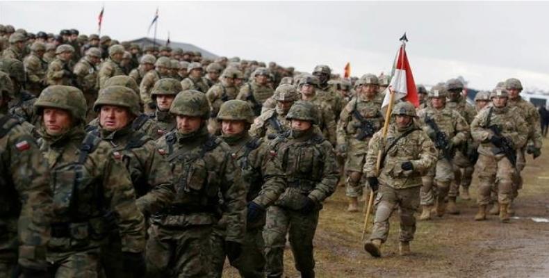 Polish and American soldiers at a welcoming ceremony for NATO troops in Poland.  Photo: Reuters