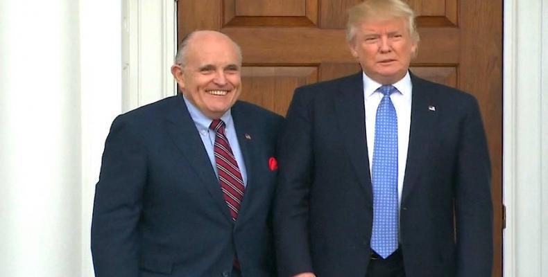 &quot;What's so funny, Rudy?&quot;   Trump and personal attorney at a photo-op.  (Photo: AFP)