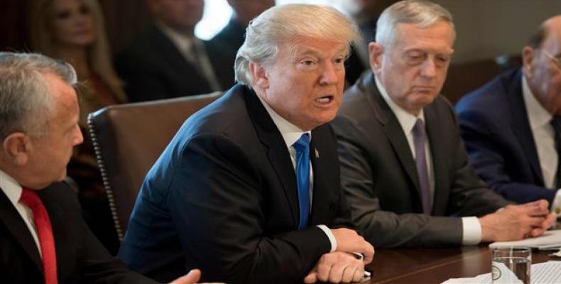 US President Donald Trump speaks alongside Secretary of Defense Jim Mattis (2nd R) as he holds a Cabinet Meeting in the Cabinet Room at the White House in Washi