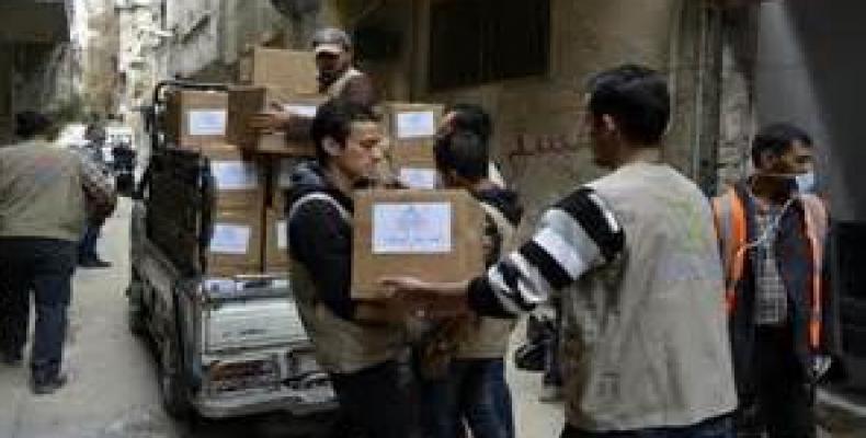 Autoridades de la provincia siria de Latakia comunicaron que personas desplazadas en ese territorio recibieron ayuda humanitaria