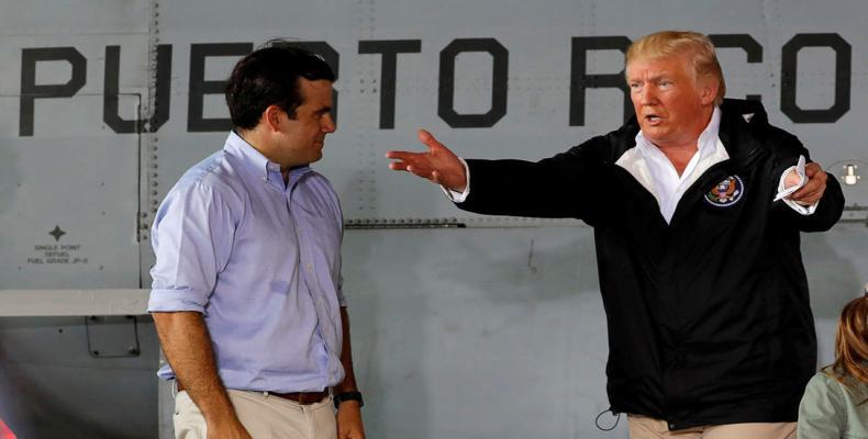 Donald Trump y Ricardo Rosselló, gobernador de Puerto Rico, durante una reunión en Carolina (Puerto Rico, EE.UU.), el 3 de octubre de 2017.Reuters