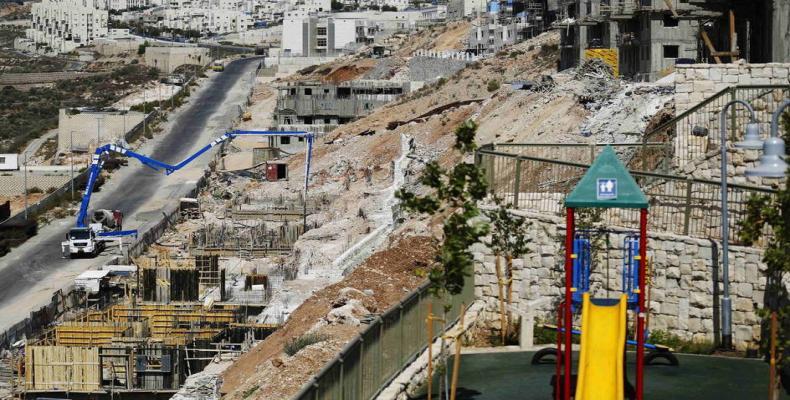 Houses under construction are seen in the occupied West Bank settlement of Amichai, on September 7, 2018.  Photo: AFP