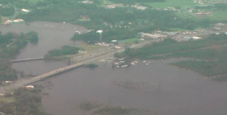 Hurricane Florence death toll reaches 32 as threat of toxic coal ash release looms.  Photo: Democracy Now