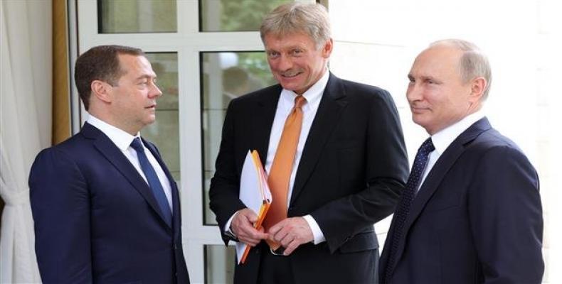 Russia's presidential spokesman Dmitry Peskov (C), President Vladimir Putin (R), and Prime Minister Dmitry Medvedev.  Photo: AFP 