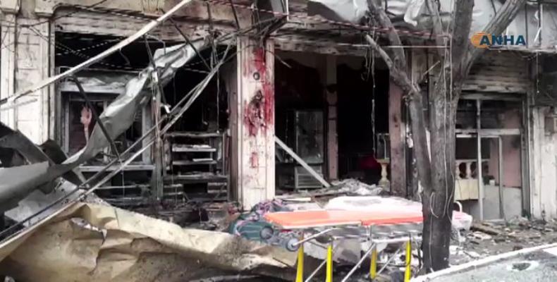 An image grab taken from a video published by Hawar News Agency (ANHA) on January 16, 2019, shows the scene of a bomb attack in the northern Syrian city of Manb