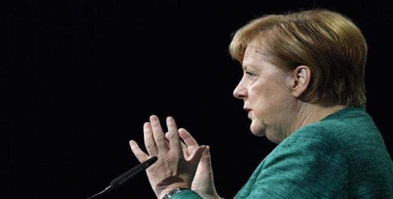 German Chancellor Angela Merkel addresses the audience during a conference organized by the Federation of German Industries (BDI) on September 25, 2018 in Berli