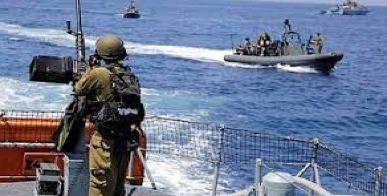 Three fishermen were injured after Israeli naval forces opened fire on their boats off the coast of the besieged Gaza Strip.