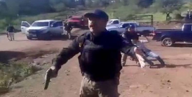 An officer sent to break up the peaceful anti-mining protest in Guazapares, Chihuahua, Mexico.  Photo: Facebook