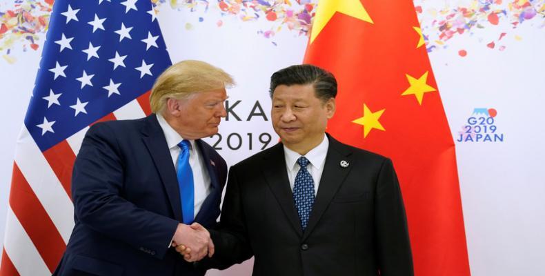 Donald Trup y Xi Jinping se dan la mano en la cumbre del G20 de Osaka (Japón), el 29 de junio de 2019. Kevin Lamarque / Reuters