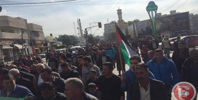 Palestinians stage a protest rally in the besieged Gaza Strip on December 3, 2018.  Photo: Ma'an News Agency