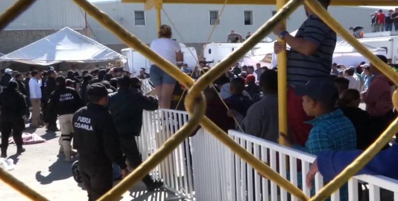 Migrant asylum seekers imprisoned in abandoned Mexican factory.  Photo: Democracy Now