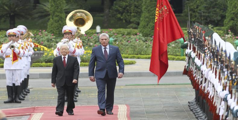 Nguyen Phu Trong,and Miguel Diaz-Canel,  review an honor guard in Hanoi, Vietnam, Friday, Nov. 9, 2018. VNA Photo