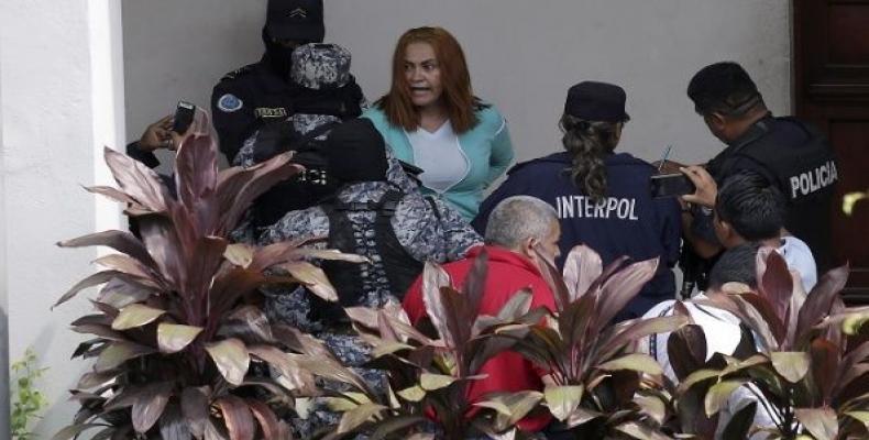 Marixa Lemus &quot;La Patrona&quot; after being re-captured by Salvadoran police. San Salvador, El Salvador.   Photo: EFE