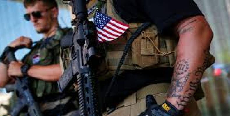 Armed militias on U.S. border with Mexico.   Photo: AFP