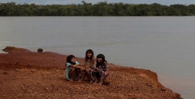 Children of the Kayapo tribe sit on the banks of Xingu River in Brazil, January 15, 2020.  (Photo: Reuters)