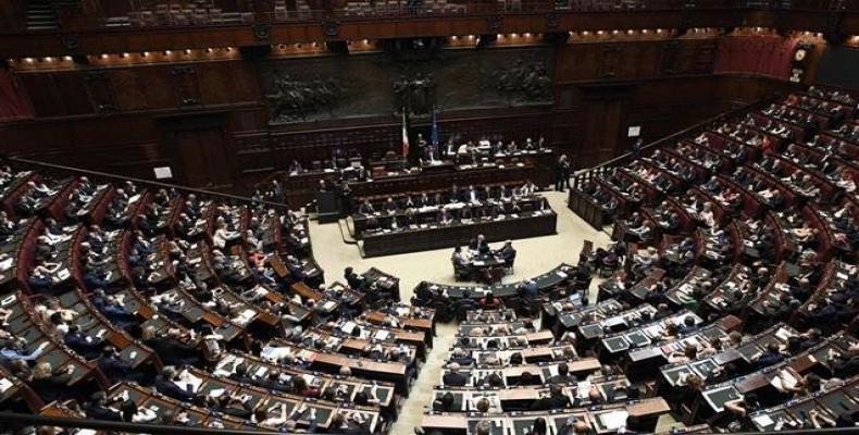 Italian premier Giuseppe Conte (C) speaks at the Lower House, ahead of a confidence vote on the government program, in Rome on June 6, 2018.  Photo: AFP