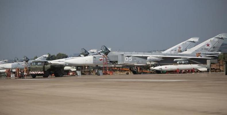 File picture shows Russian Sukhoi Su-24 fighter jets at the Russia-run Hmeimim airbase in Syria's western coastal province of Latakia.  Photo: AFP