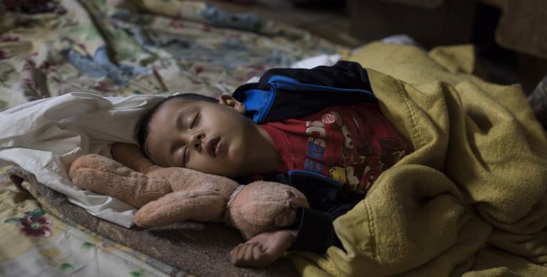 Children separated from their parents.   Photo:  AFP