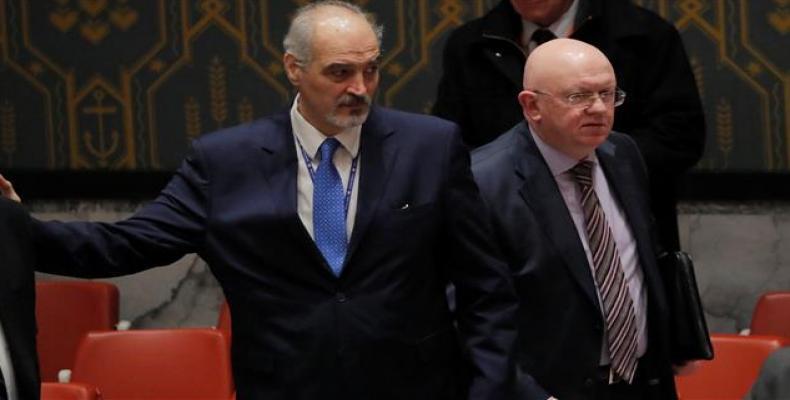 Bashar Jaafari, permanent Representative of the Syrian Arab Republic to the United Nations, along with Vasily Nebenzya, Russian's Ambassador to the United Natio