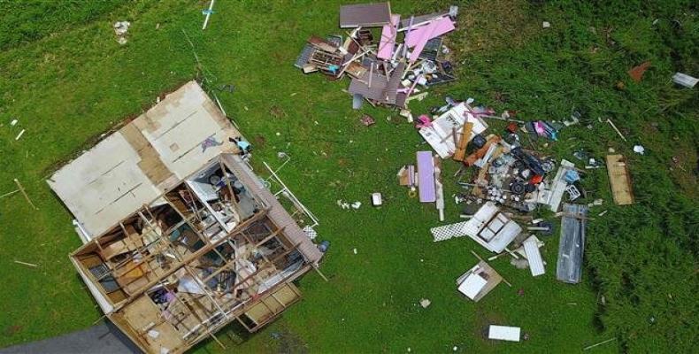 File photo taken on September 24, 2017 a house destroyed by hurricane winds is seen in Barranquitas, southwest of San Juan, Puerto Rico, following the passage o