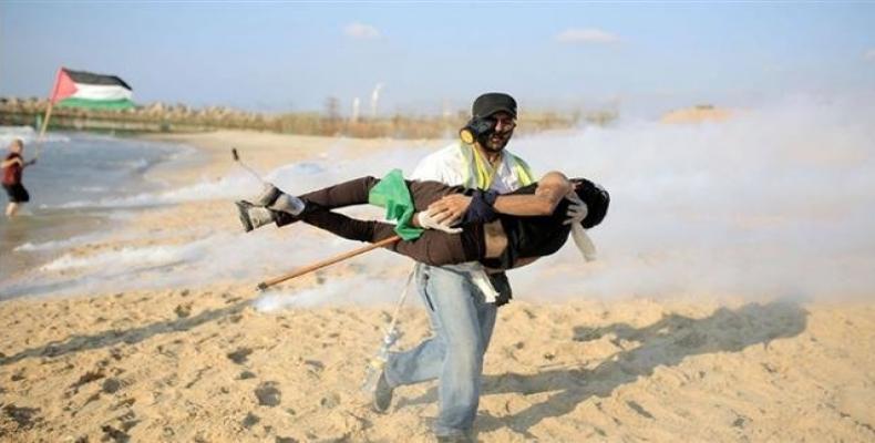 At least 20 Palestinians are wounded by live Israeli ammunition during a demonstration along Gaza’s territorial waters.  Photo: Press TV