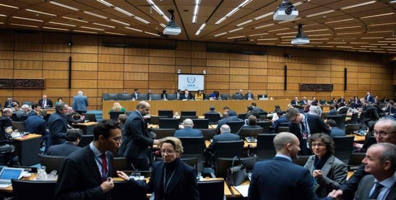 International Atomic Energy Agency's chief, Yukiya Amano (C), arrives to chair a meeting of IAEA Board of Governors on November 22, 2018 at the agency's headqu