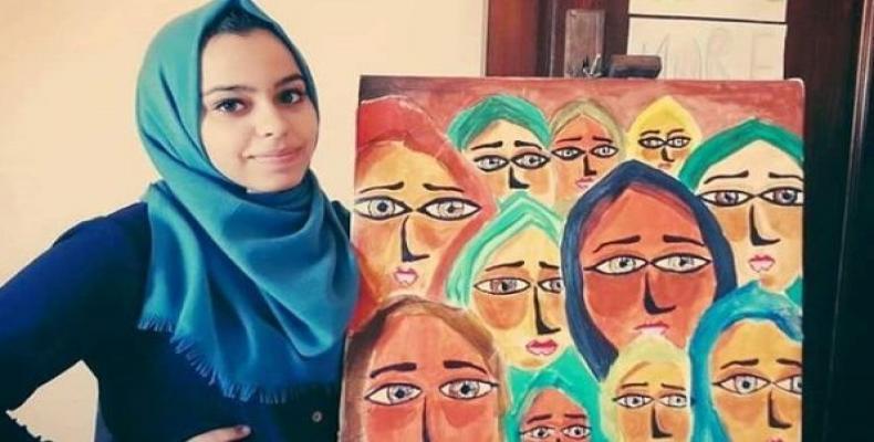 Palestinian teenage artist is denied to go to Europe to present her work.  Photo: Facebook: Malak Mattar