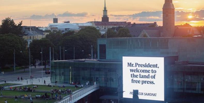 One of the billboards features a February headline, reading &quot;Trump calls media enemy of the people.&quot;  Photo: AFP