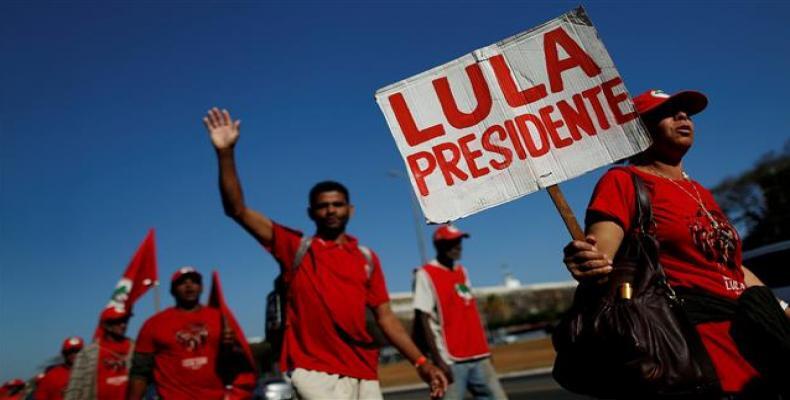 Brazil's former President Luiz Inacio Lula da Silva's supporters walk during the Free Lula March in Brasilia, Brazil, on August 14, 2018.  Photo: Reuters