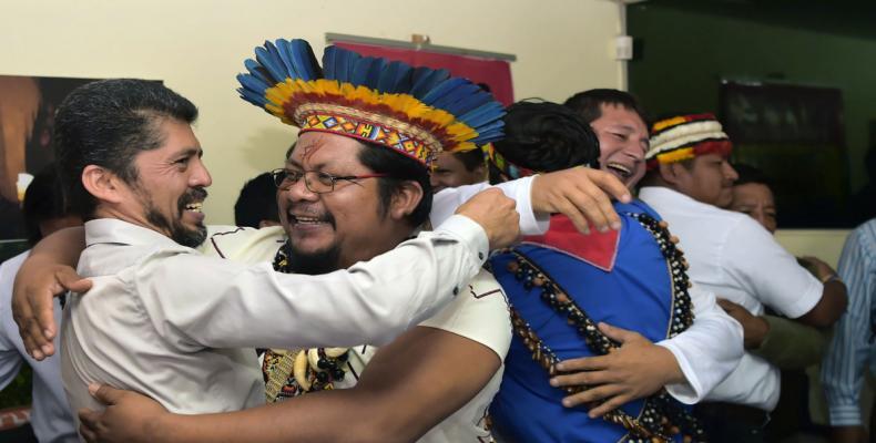 Pablo Fajardo, lawyer for the victims of environmental damage caused during Texaco's oil operations in the Ecuadoran Amazon, acquired by Chevron in 2001, celebr