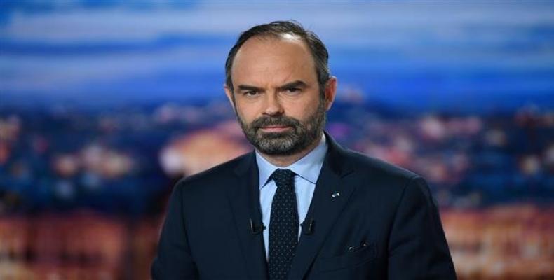 French Prime Minister Edouard Philippe poses at the French TV channel TF1 studios in Boulogne-Billancourt, near Paris, on January 7, 2019, as he makes “public o