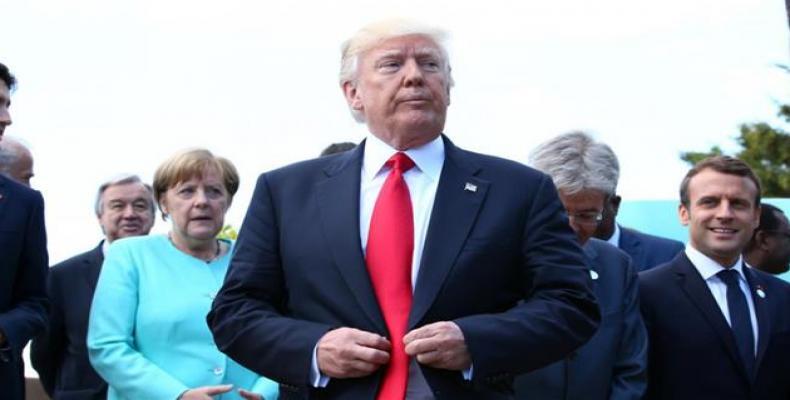 US President Donald Trump reacts after a family photo at the G-7 Summit expanded session in Taormina, Sicily, Italy, May 27, 2017.   Photo: Reuters