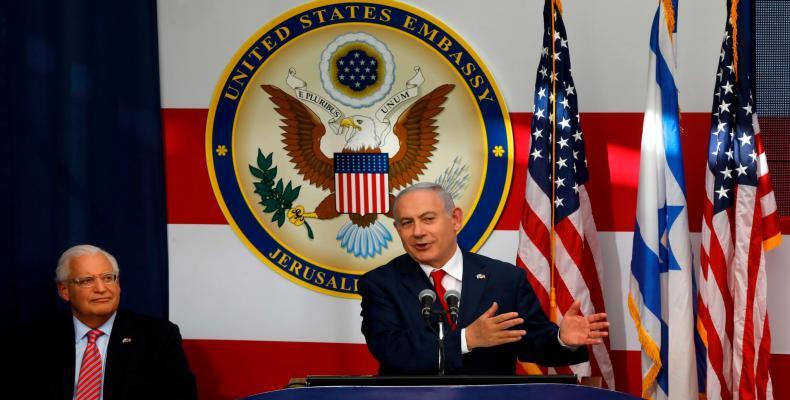 US ambassador to Israel David Friedman listens as Israeli Prime Minister Benjamin Netanyahu delivers a speech during the opening of the US embassy in Jerusalem
