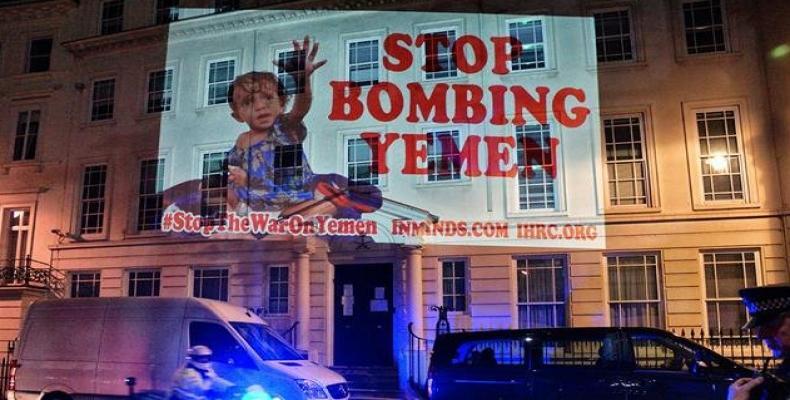This June 11, 2017 file photo shows a huge projection carried out by rights campaigners on the Saudi embassy in London to demand a stop the kingdom's devastati