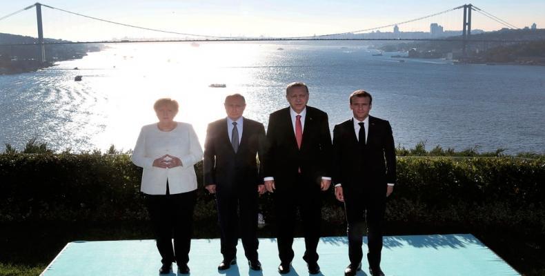 Angela Merkel, Vladimir Putin, Recep Erdogan y Emmanuel Macron (AP)