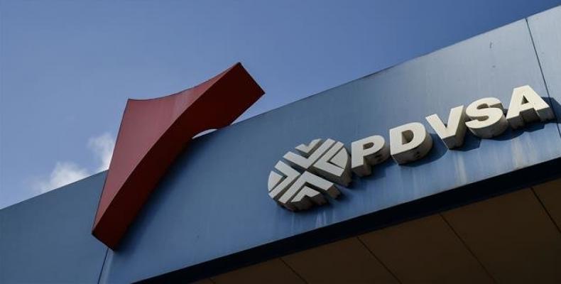 The logo of the Venezuelan state-owned oil company PDVSA is seen at a gas station in Caracas, on January 29, 2019.  Photo: AFP