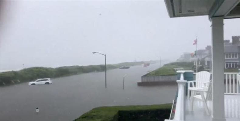 A road is submerged in flood water after heavy rains in Spring Lake, New Jersey, on August 13, 2018.  Photo: Reuters