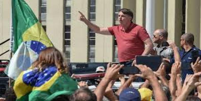 Supporters of far-right Brazilian President Jair Bolsonaro take part in a protest on Sunday in Brasilia (Photo:Ueslei Marcelino/Reuters)