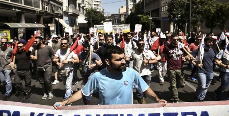Demonstrators protest in downtown Athens during a 24-hour general strike on May 30, 2018.  Photo: AFP
