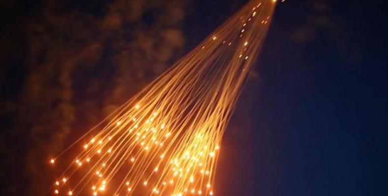Still photo shows suspected white phosphorus munitions raining down on the northern Syrian city of Raqqah in June 2017.  Photo: Via the New Arab