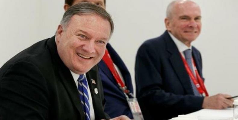 Secretary of State Mike Pompeo with senior adviser Michael McKinley.  (Photo: Reuters)