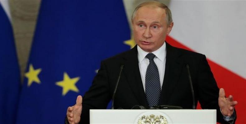 Russian President Vladimir Putin speaks during a joint news conference with Italian Prime Minister Giuseppe Conte following their talks at the Kremlin in Moscow