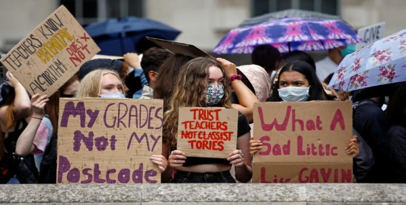 A level students hold placards as they protest opposite Downing Street in London.  (Photo: Reuters/Henry Nicholls/File Photo)