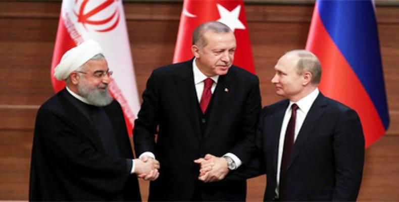 President Hassan Rouhani,Turkish President Recep Tayyip Erdogan and  Russian President Vladimir Putin. RT Photo
