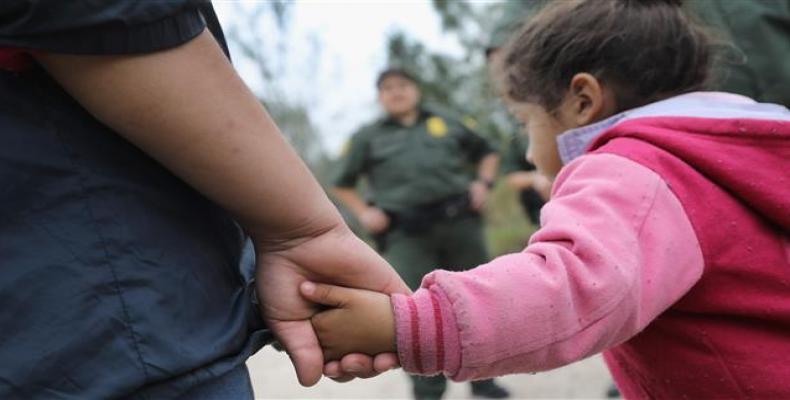 U.S. immigrants arrested trying to save children in custody.  Photo: AP