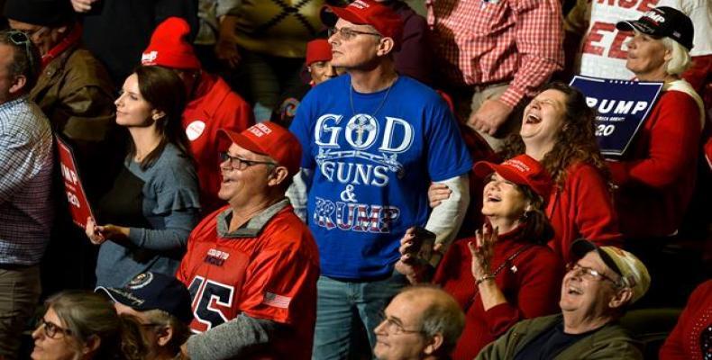 &quot;God, Guns and Trump&quot; -- campaign rally in Tupelo, Mississippi.  (Photo: AFP)