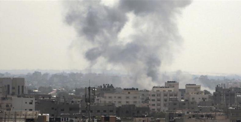 Smoke rises from the site of an Israeli airstrike on Gaza City on May 29, 2018.   Photo: AP