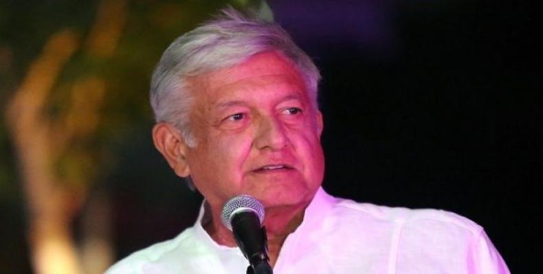 Center-left front-runner Andres Manuel Lopez Obrador of the National Regeneration Movement delivers a message after arriving at the third and final debate in Me