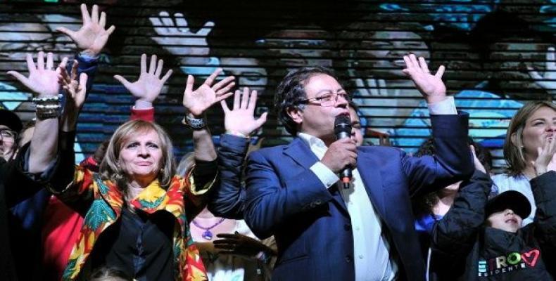 Presidential candidate Gustavo Petro is accompanied by relatives as he addresses supporters after being defeated by Ivan Duque in Colombia's presidential electi